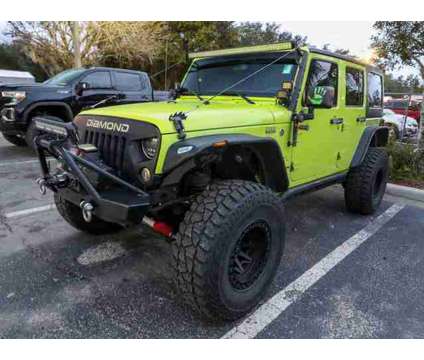 2016 Jeep Wrangler Unlimited Sahara is a 2016 Jeep Wrangler Unlimited Car for Sale in Homosassa FL