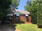 This cute but small brick home is located in Ol. 388 Ashley Ave NE