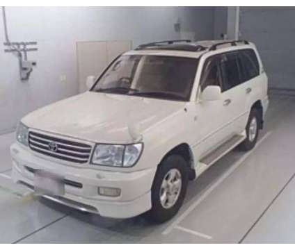 1999 Toyota Land Cruiser for sale is a White 1999 Toyota Land Cruiser Car for Sale in Houston TX