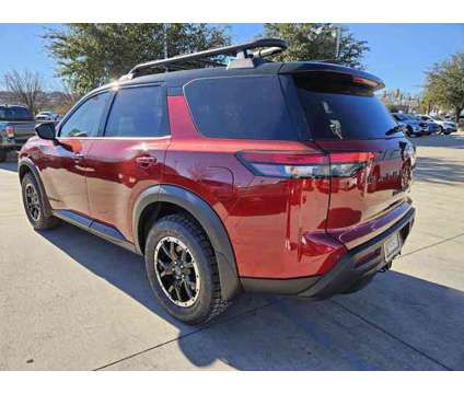 2024 Nissan Pathfinder Rock Creek 4WD is a Black, Red 2024 Nissan Pathfinder SUV in Saint George UT