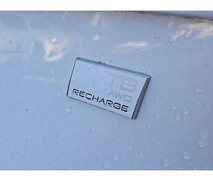 2024 Volvo XC90 Recharge Plug-In Hybrid Plus Bright Theme is a White 2024 Volvo XC90 3.2 Trim Hybrid in Auburn MA