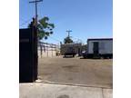 Big empty commercial lot - 4500 sq. ft total with office trailer