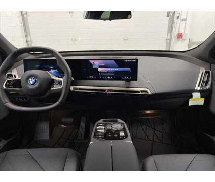 2024 BMW iX xDrive50 is a White 2024 BMW 325 Model iX SUV in Erie PA