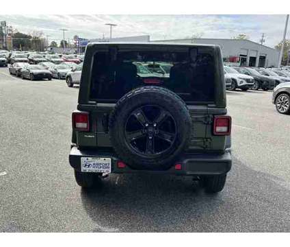 2021 Jeep Wrangler Unlimited Sahara Altitude is a Green 2021 Jeep Wrangler Unlimited SUV in Mobile AL