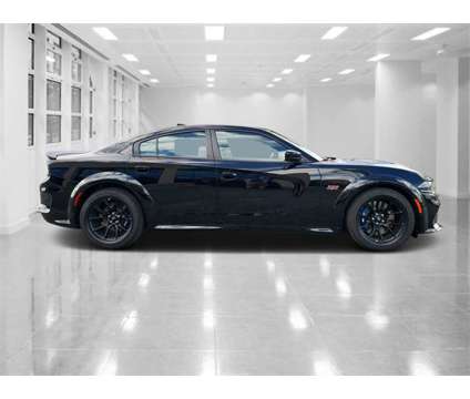 2023 Dodge Charger R/T Scat Pack Widebody is a Black 2023 Dodge Charger R/T Car for Sale in Orlando FL