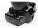 Minolta SPxi QD 35mm SLR w/AF 28-200mm zoom lens, strap, cap, Pola, hood, tested