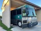 Solid 1997 MCI bus with existing bathroom + all rooms already framed in steel