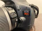 Canon EOS Rebel T2i DSLR Camera with EF-S 18-55mm f / 3.5-5.6 Batteries Charger