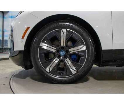 2024 BMW iX xDrive50 is a White 2024 BMW 325 Model iX SUV in Lake Bluff IL