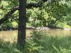 Hillman, This remarkable 0.83 +/- acre wooded lot is a