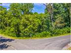 Cherished Lake Access and Mountain Views: Your Dream Lot in Whitesburg, TN