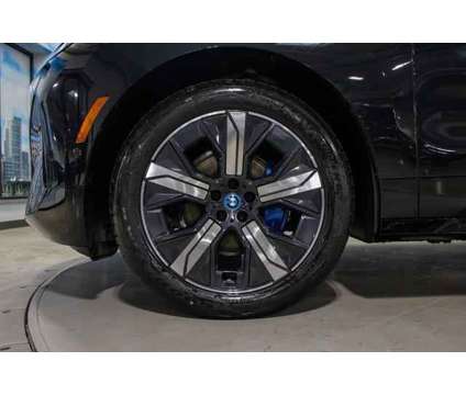 2024 BMW iX xDrive50 is a Black 2024 BMW 325 Model iX SUV in Lake Bluff IL