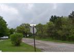 West Branch, Nice wooded corner lot just outside the city