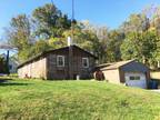 Log home on country road 2 minutes from Route 83.