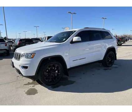 2021 Jeep Grand Cherokee Laredo E 4x4 is a White 2021 Jeep grand cherokee Laredo SUV in Grand Island NE