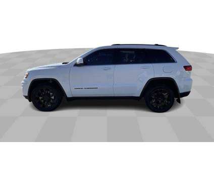 2021 Jeep Grand Cherokee Laredo E 4x4 is a White 2021 Jeep grand cherokee Laredo SUV in Grand Island NE