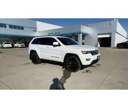 2021 Jeep Grand Cherokee Laredo E 4x4 is a White 2021 Jeep grand cherokee Laredo SUV in Grand Island NE