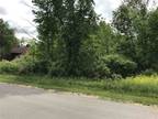 Gladwin, Unimproved lot across from Golf Course