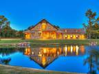 Discover Unrivaled Modern Ranch Luxury with Pond