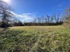 Almost 2 Acres of Secluded Land!