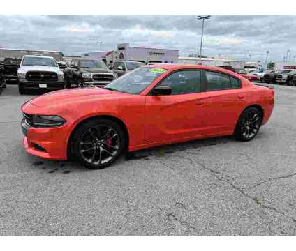 2023 Dodge Charger SXT Blacktop Special Edition is a Gold 2023 Dodge Charger SXT Sedan in Fort Smith AR