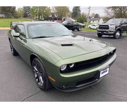 2023 Dodge Challenger SXT is a Green 2023 Dodge Challenger SXT Coupe in Freeport IL
