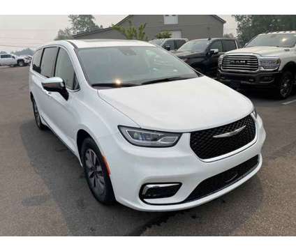 2023 Chrysler Pacifica Hybrid Limited is a White 2023 Chrysler Pacifica Hybrid in Oswego NY
