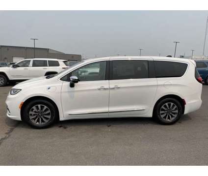 2023 Chrysler Pacifica Hybrid Limited is a White 2023 Chrysler Pacifica Hybrid in Oswego NY
