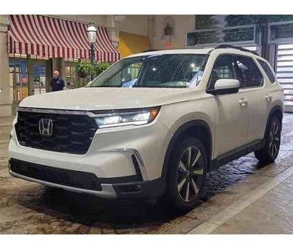 2023 Honda Pilot Touring is a Silver, White 2023 Honda Pilot Touring SUV in Doylestown PA