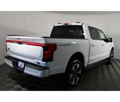 2023 Ford F-150 Lightning Platinum is a White 2023 Ford F-150 Platinum Truck in Kansas City MO