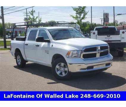 2023 Ram 1500 Classic Tradesman is a White 2023 RAM 1500 Model Tradesman Truck in Walled Lake MI