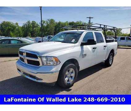 2023 Ram 1500 Classic Tradesman is a White 2023 RAM 1500 Model Tradesman Truck in Walled Lake MI