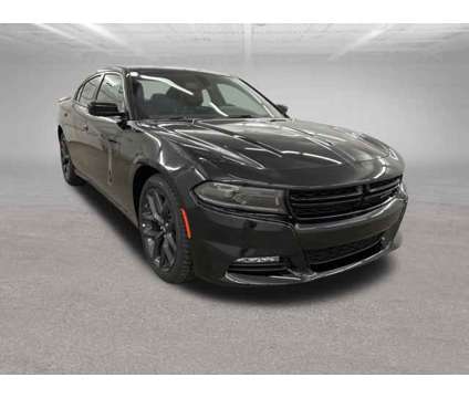 2023 Dodge Charger SXT is a Black 2023 Dodge Charger SXT Sedan in Ottumwa IA