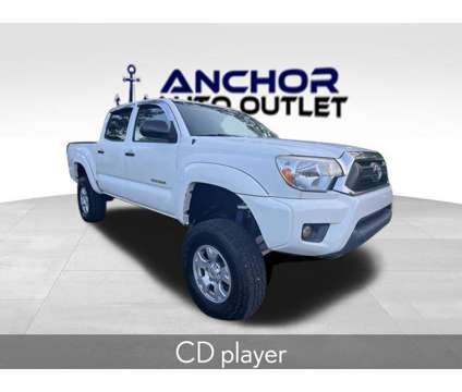 2015 Toyota Tacoma PreRunner V6 is a White 2015 Toyota Tacoma PreRunner Truck in Cary NC