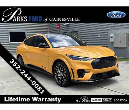 2023 Ford Mustang Mach-E GT is a Orange 2023 Ford Mustang GT SUV in Gainesville FL