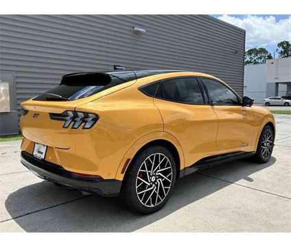 2023 Ford Mustang Mach-E GT is a Orange 2023 Ford Mustang GT SUV in Gainesville FL