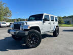 2012 Jeep Wrangler Unlimited 4WD 4dr Sahara with leather seats and lifted