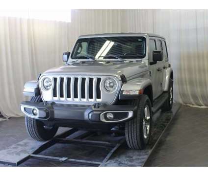 2020 Jeep Wrangler Unlimited Sahara is a Silver 2020 Jeep Wrangler Unlimited Sahara SUV in Bay City MI