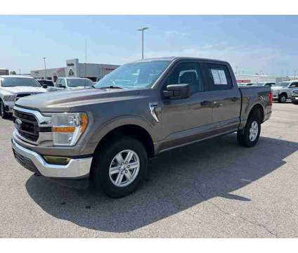 2021 Ford F-150 XLT is a Grey 2021 Ford F-150 XLT Truck in Fort Smith AR