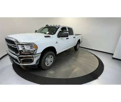 2024 Ram 2500 Tradesman is a White 2024 RAM 2500 Model Tradesman Truck in Manassas VA