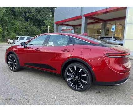 2023 Toyota Crown Platinum is a Red 2023 Toyota Crown Sedan in Vicksburg MS