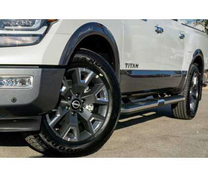 2024 Nissan Titan Platinum Reserve is a White 2024 Nissan Titan Platinum Reserve Truck in San Marcos TX