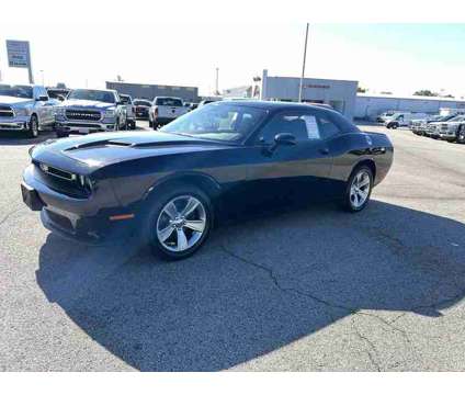 2021 Dodge Challenger SXT is a Black 2021 Dodge Challenger SXT Coupe in Fort Smith AR