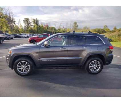 2014 Jeep Grand Cherokee Limited is a Grey 2014 Jeep grand cherokee Limited SUV in Ransomville NY