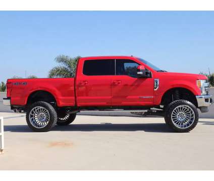2017 Ford F-250SD LIFTED Lariat 4WD DIESEL is a Red 2017 Ford F-250 Lariat Truck in Oxnard CA