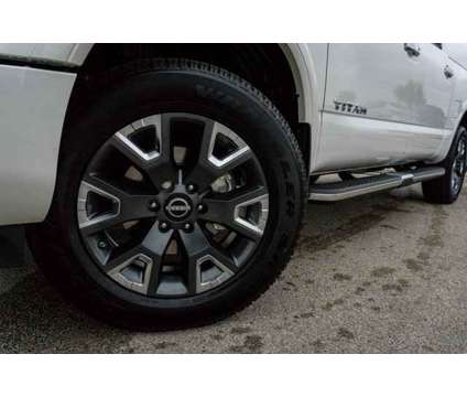 2024 Nissan Titan Platinum Reserve is a White 2024 Nissan Titan Platinum Reserve Truck in San Marcos TX