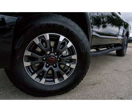 2024 Nissan Titan PRO-4X is a Black 2024 Nissan Titan PRO-4X Truck in San Marcos TX