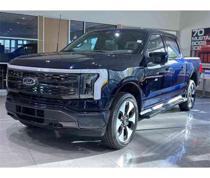 2023 Ford F-150 Lightning Platinum is a Blue 2023 Ford F-150 Platinum Truck in Zelienople PA