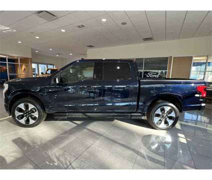 2023 Ford F-150 Lightning Platinum is a Blue 2023 Ford F-150 Platinum Truck in Zelienople PA