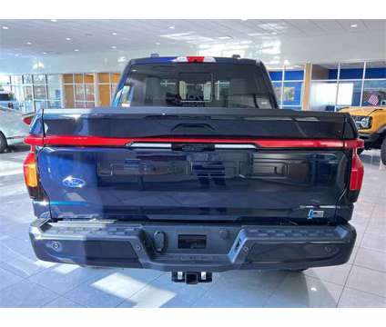 2023 Ford F-150 Lightning Platinum is a Blue 2023 Ford F-150 Platinum Truck in Zelienople PA